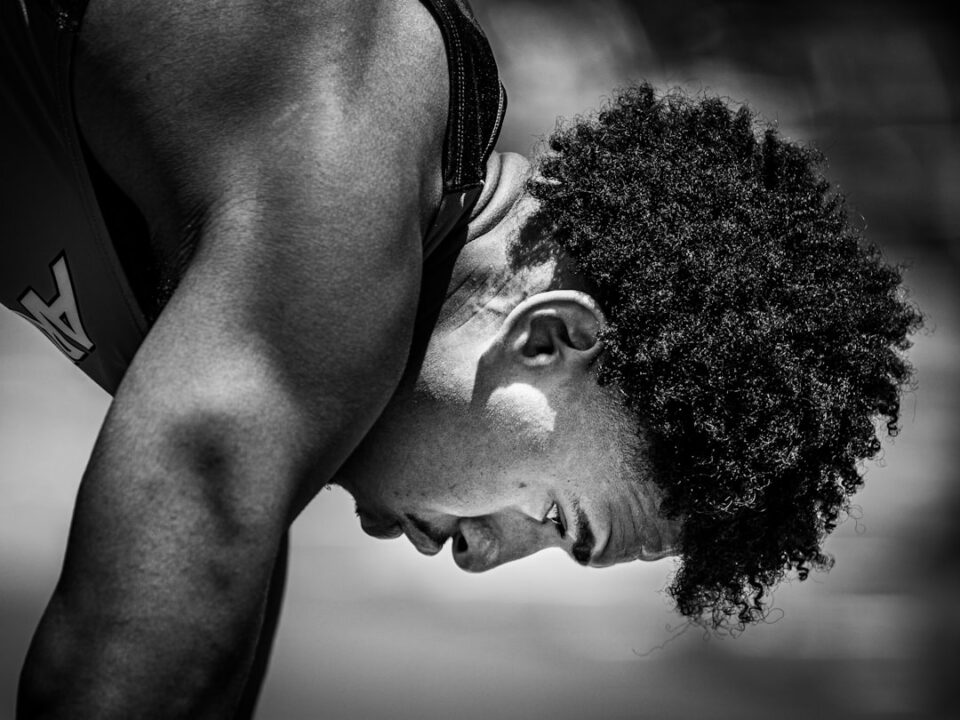 sports mental adjustment cover showing a calm athlete preparing with a notebook and training field