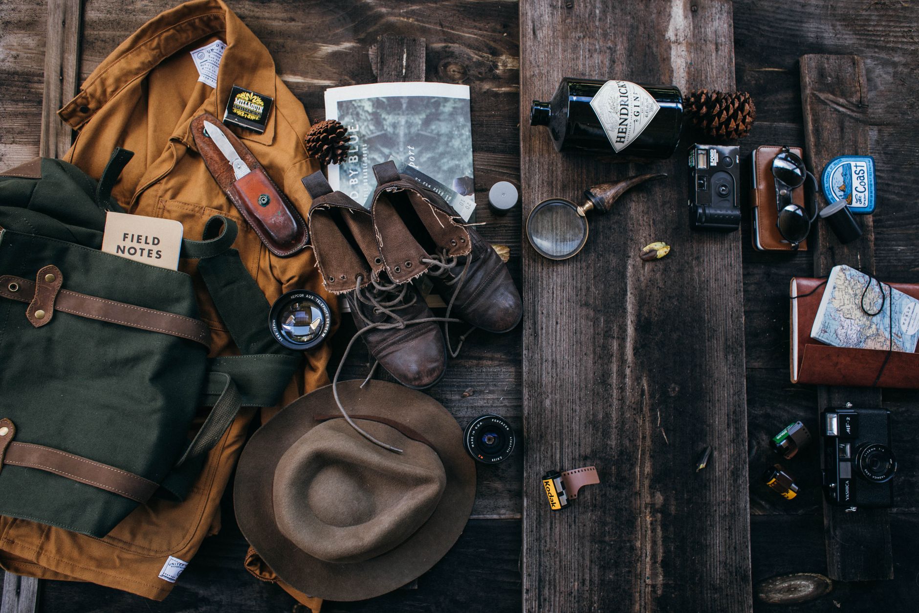 cover illustration of lightweight backpacking checklist essentials grouped by category on a clean flat background